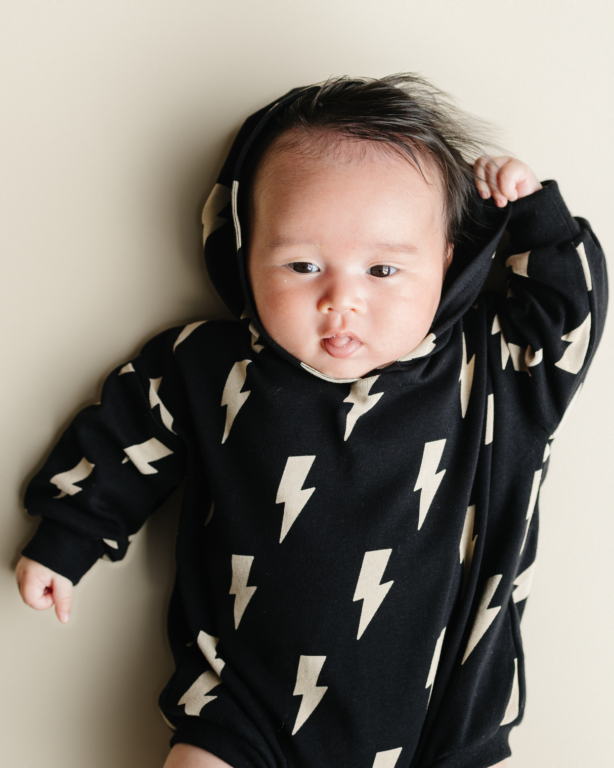 Hooded Bubble Romper | Black Bolts - HoneyBug