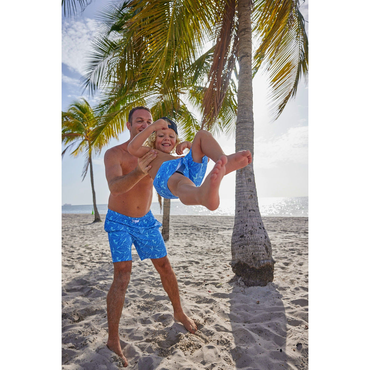 Coconut Cottage Men's Trunks - HoneyBug