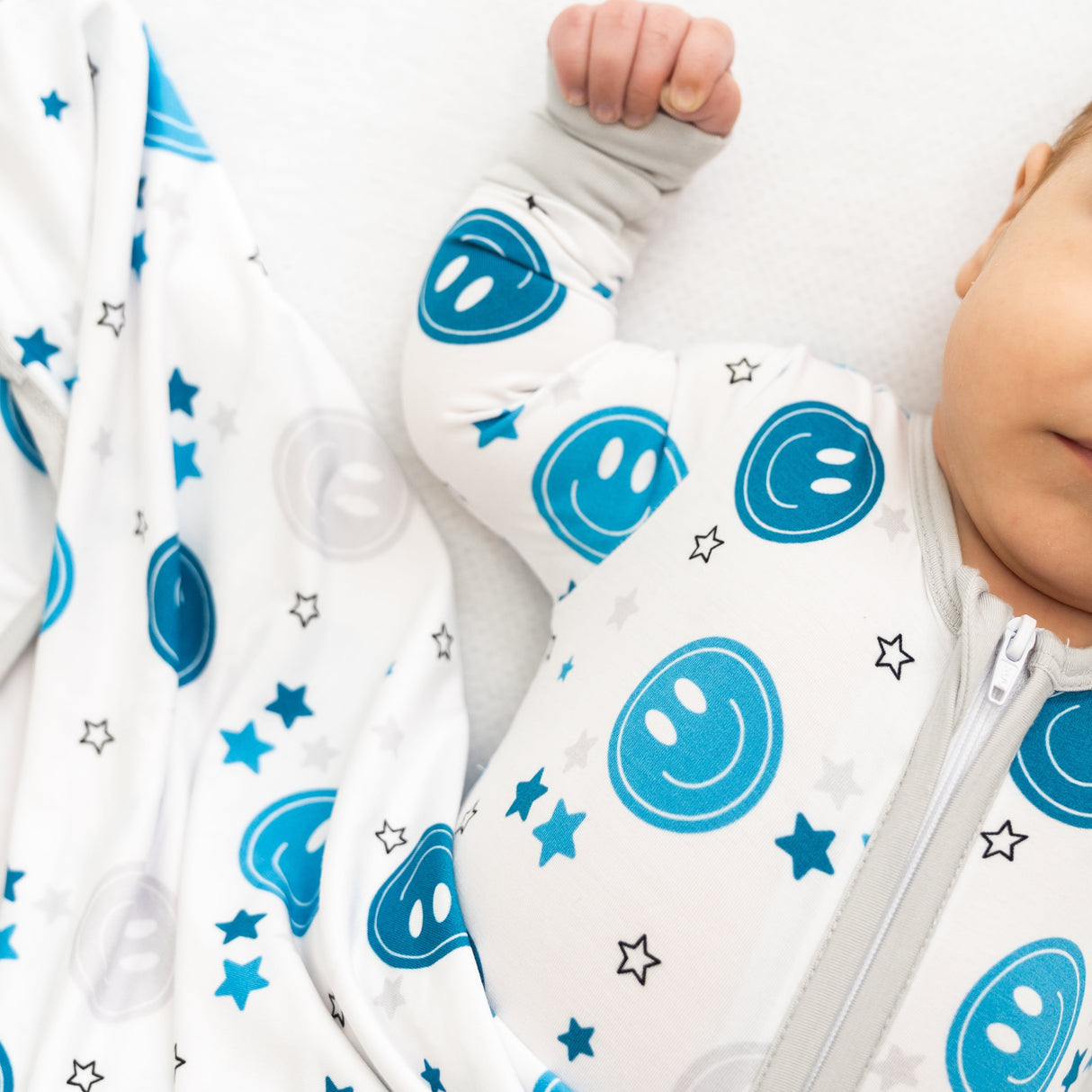 Blue Smiley Coverall