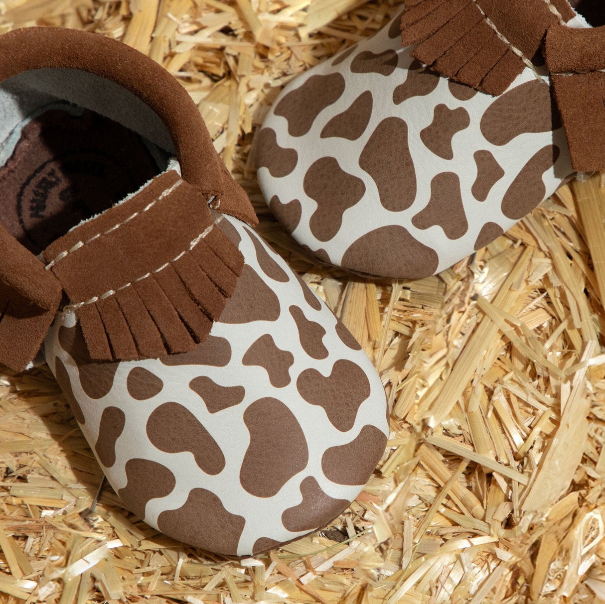 Suede Cow Print Moccasin Baby Shoe - HoneyBug