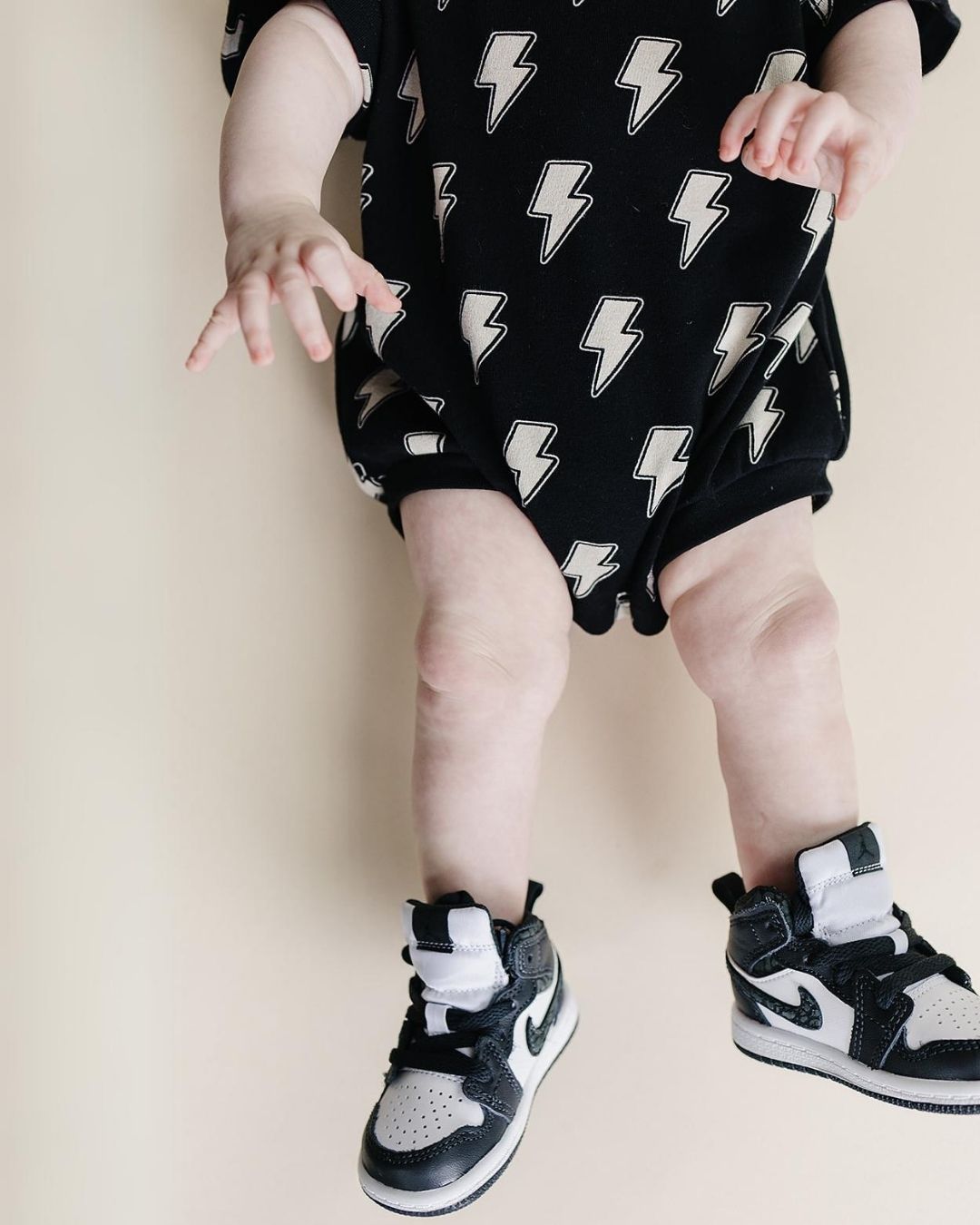 Short Sleeve Bubble Romper | Black Bolts - HoneyBug