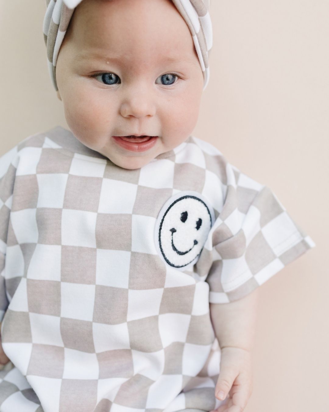 Short Sleeve Bubble Romper | Checkered Smiley Latte - HoneyBug