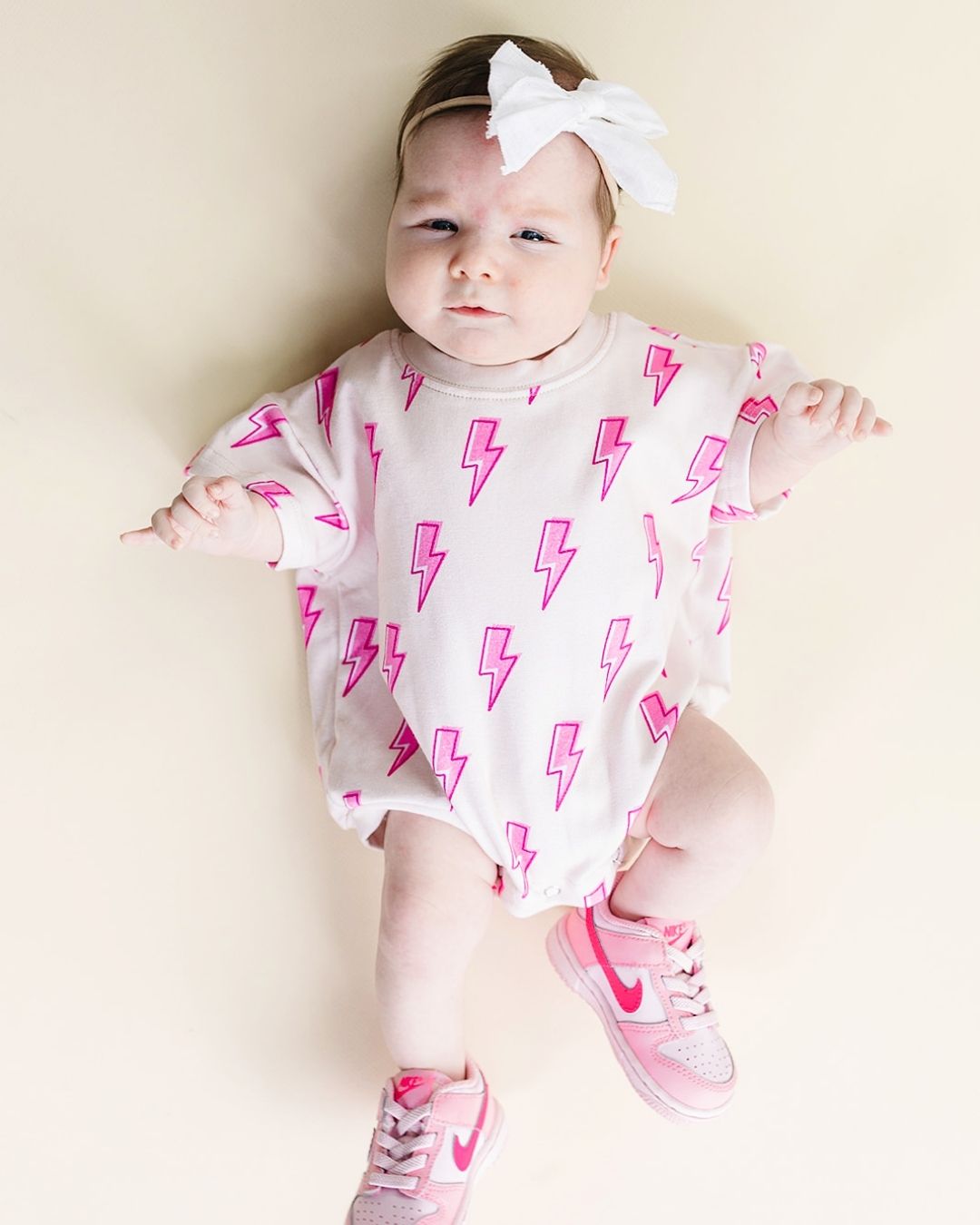 Short Sleeve Bubble Romper | Pink Bolts - HoneyBug
