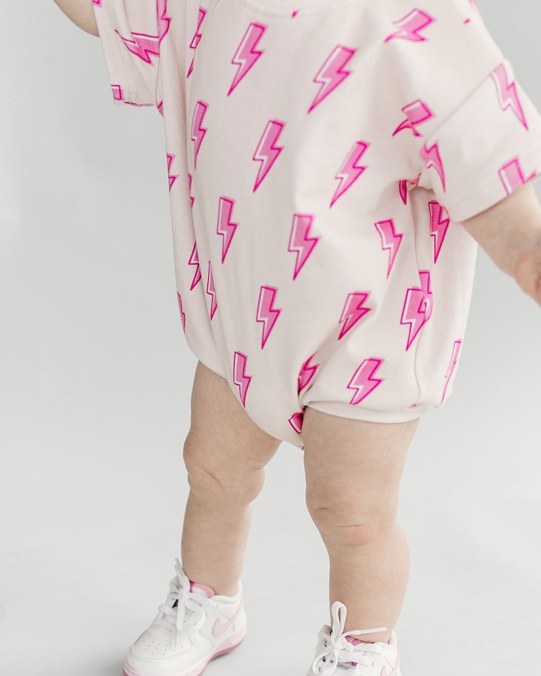 Short Sleeve Bubble Romper | Pink Bolts - HoneyBug