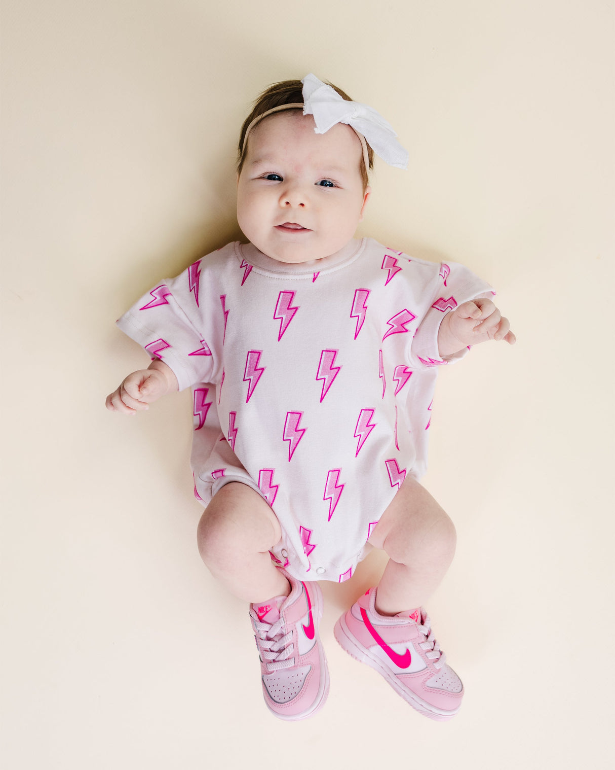 Short Sleeve Bubble Romper | Pink Bolts - HoneyBug 