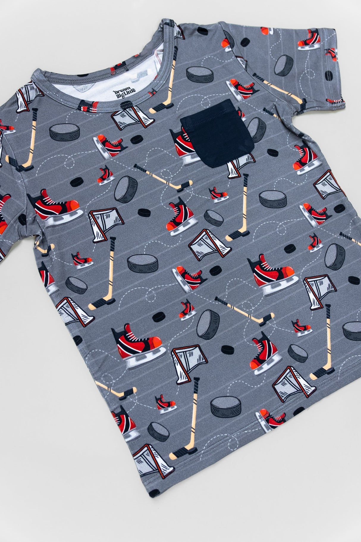 AT THE RINK DREAM POCKET TEE - HoneyBug 