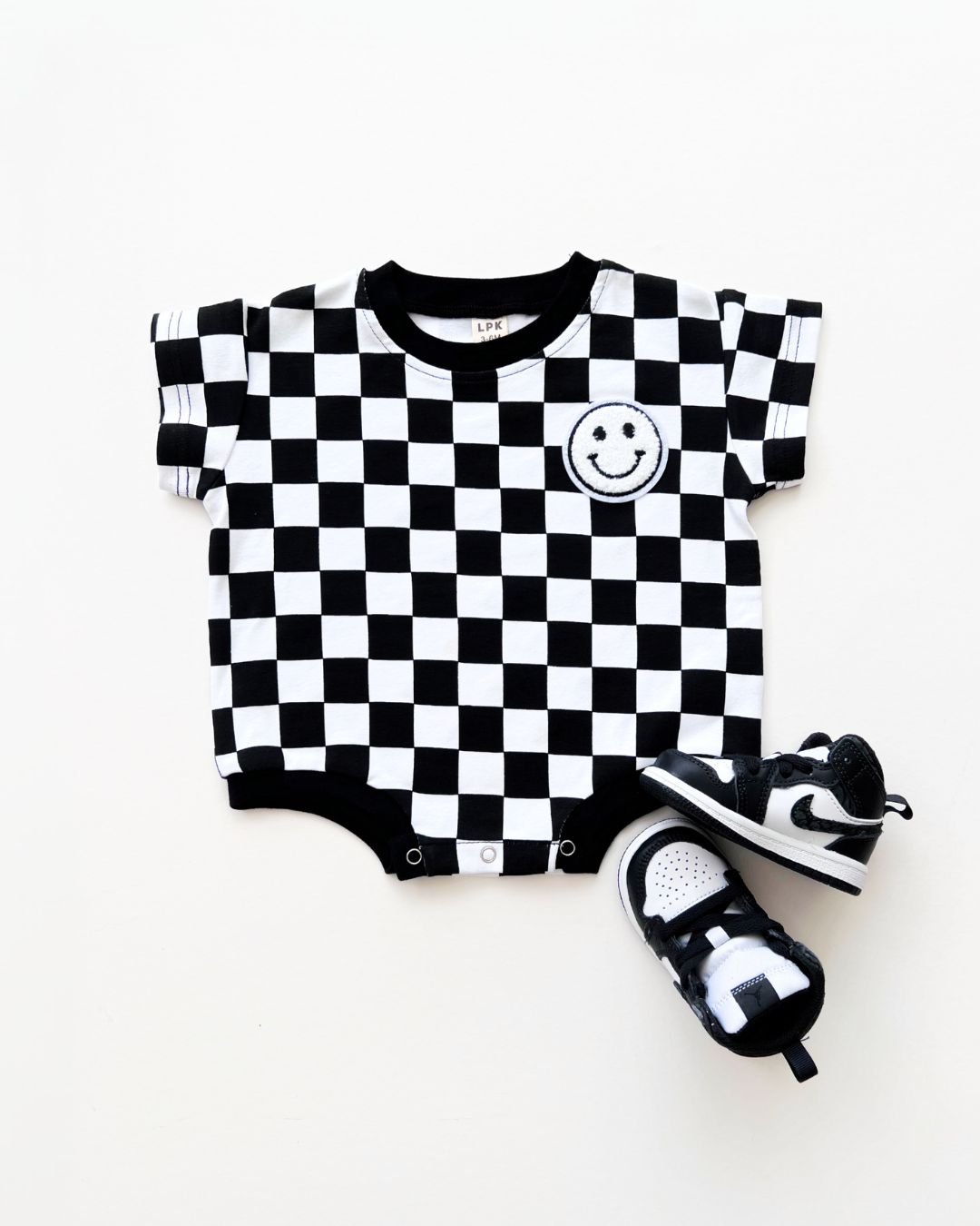 Short Sleeve Bubble Romper | Checkered Smiley Black - HoneyBug 